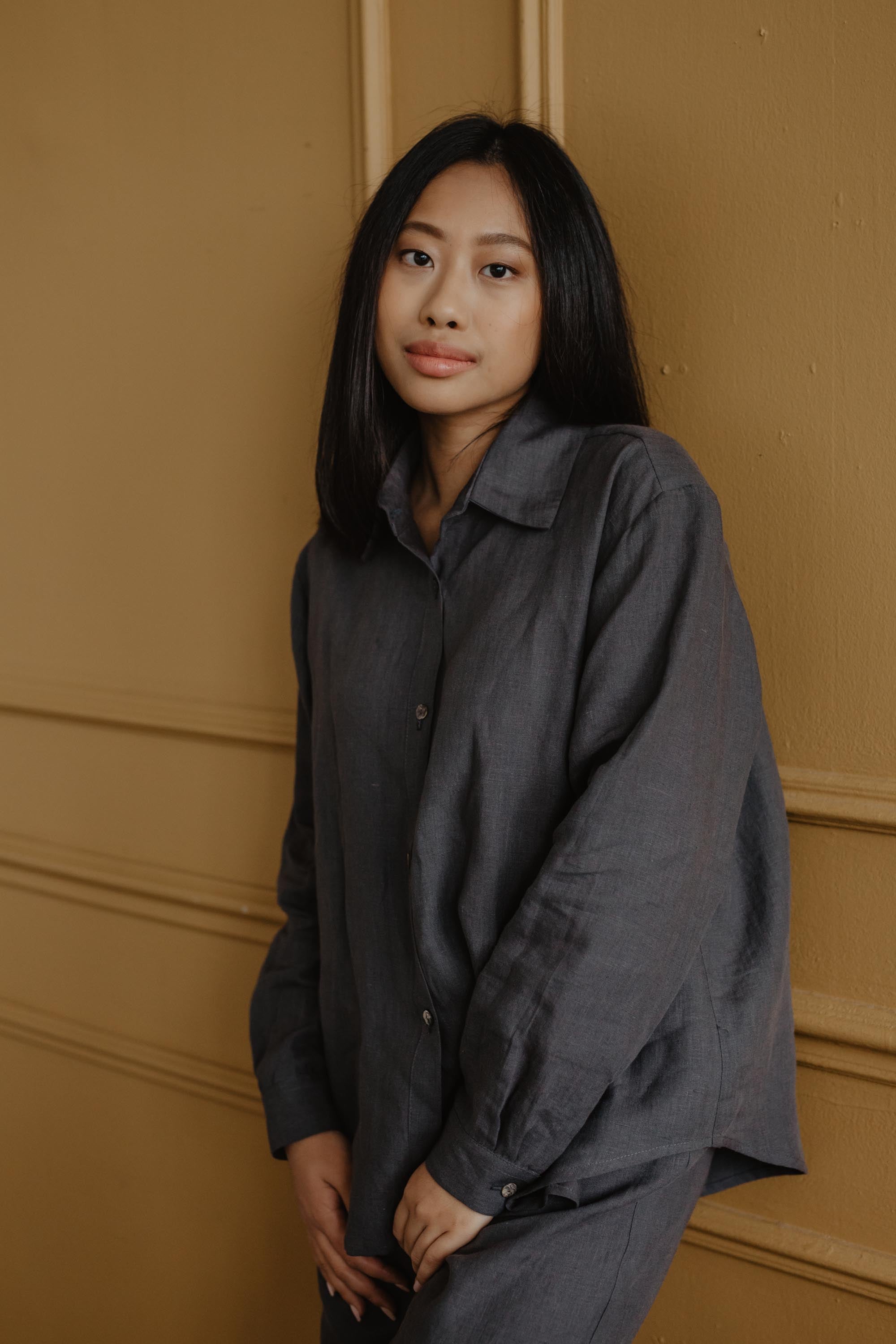 Woman Wearing A Grey Linen Casual Shirt And Grey Linen Pants By AmourLinen