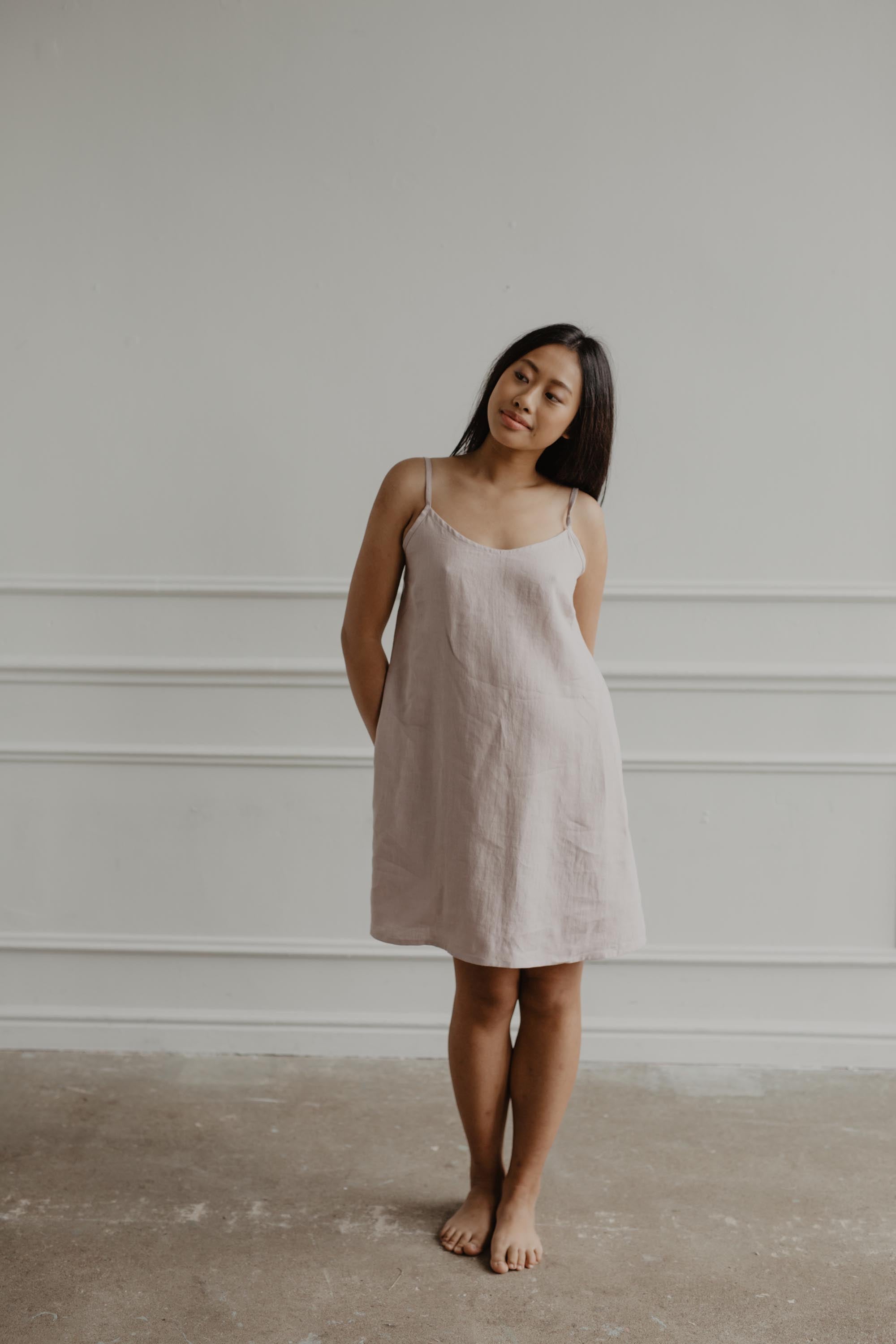 Woman Wearing A Linen Night Gown By Amour Linen In White Room