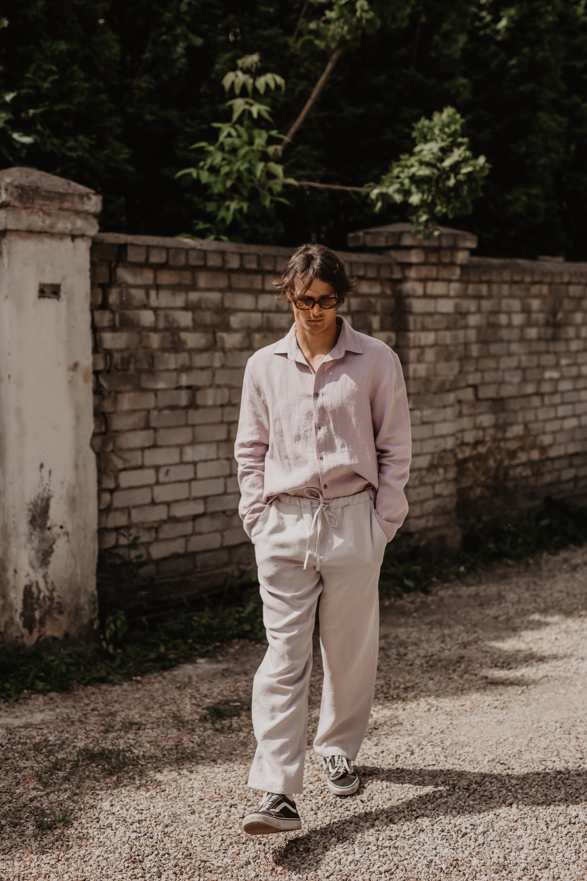 Man Wearing Classic Linen Shirt Walking Towards Camera